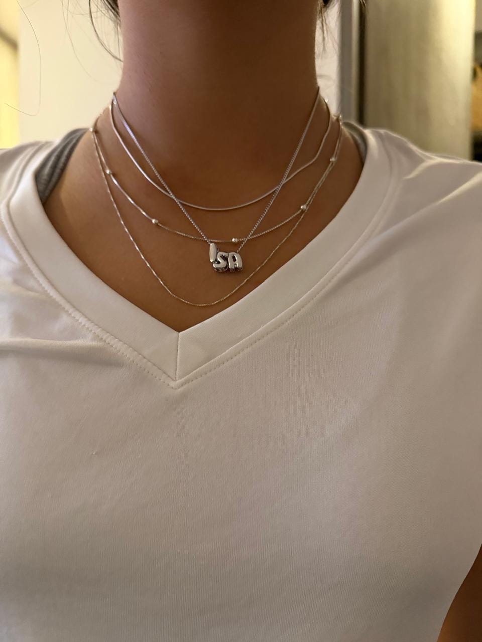 Customer photo review of Personaliza Tu Collar Con Inicial Mini Bubble Plateado