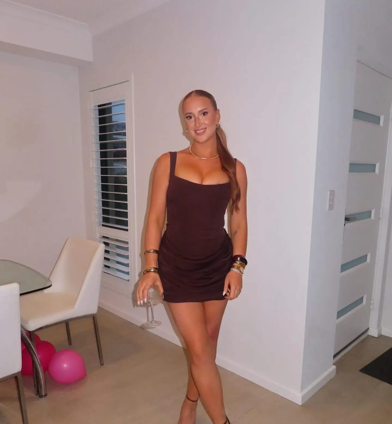 Customer photo review of Amari Sleeveless Mini Dress