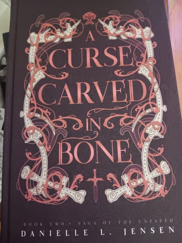 Customer photo review of [PREORDER] A Curse Carved in Bone by Danielle L. Jensen - SE hardcover