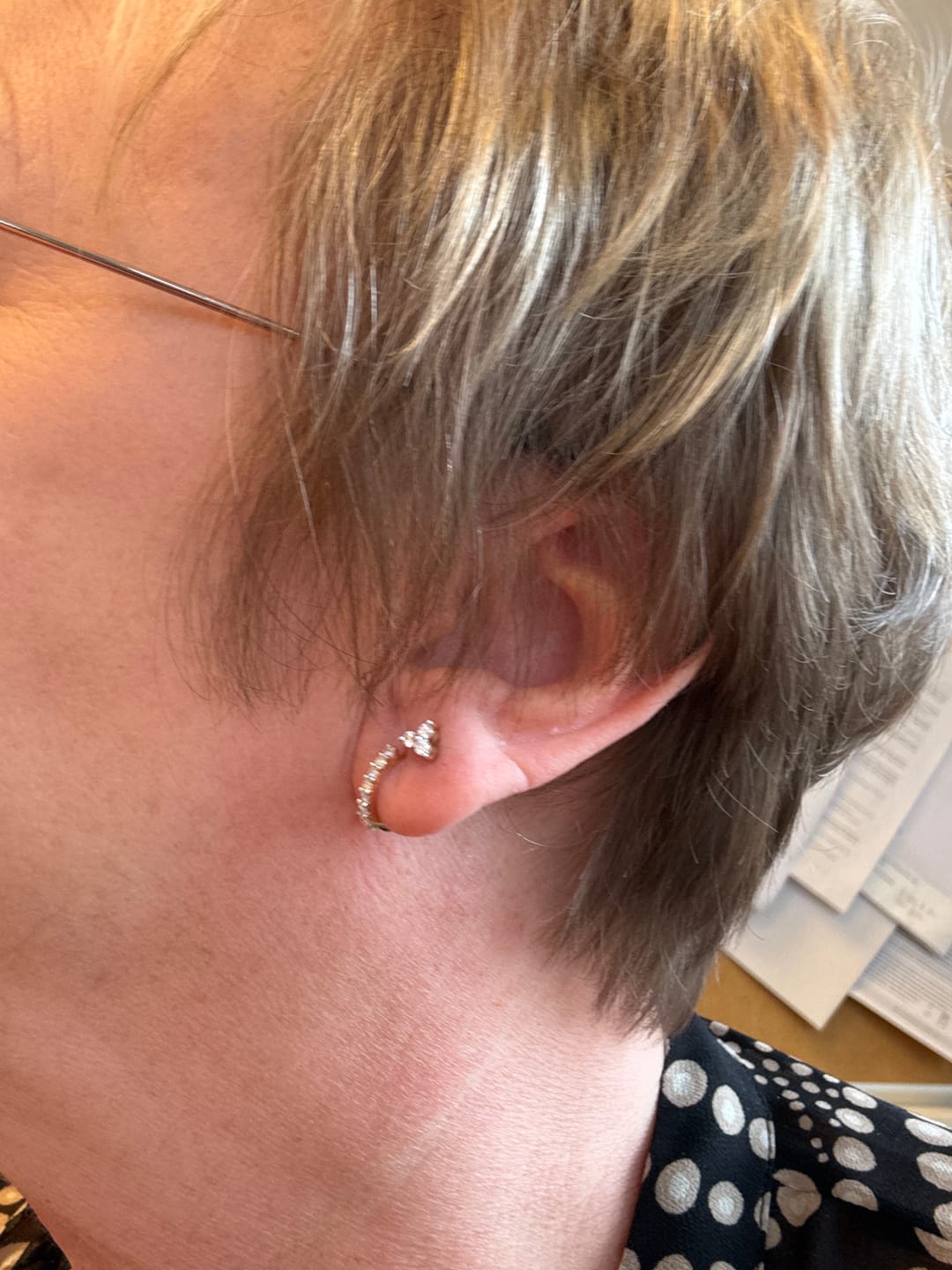 Customer photo review of Versa Single Spark Lab Grown Diamond Huggies Hoop Earrings