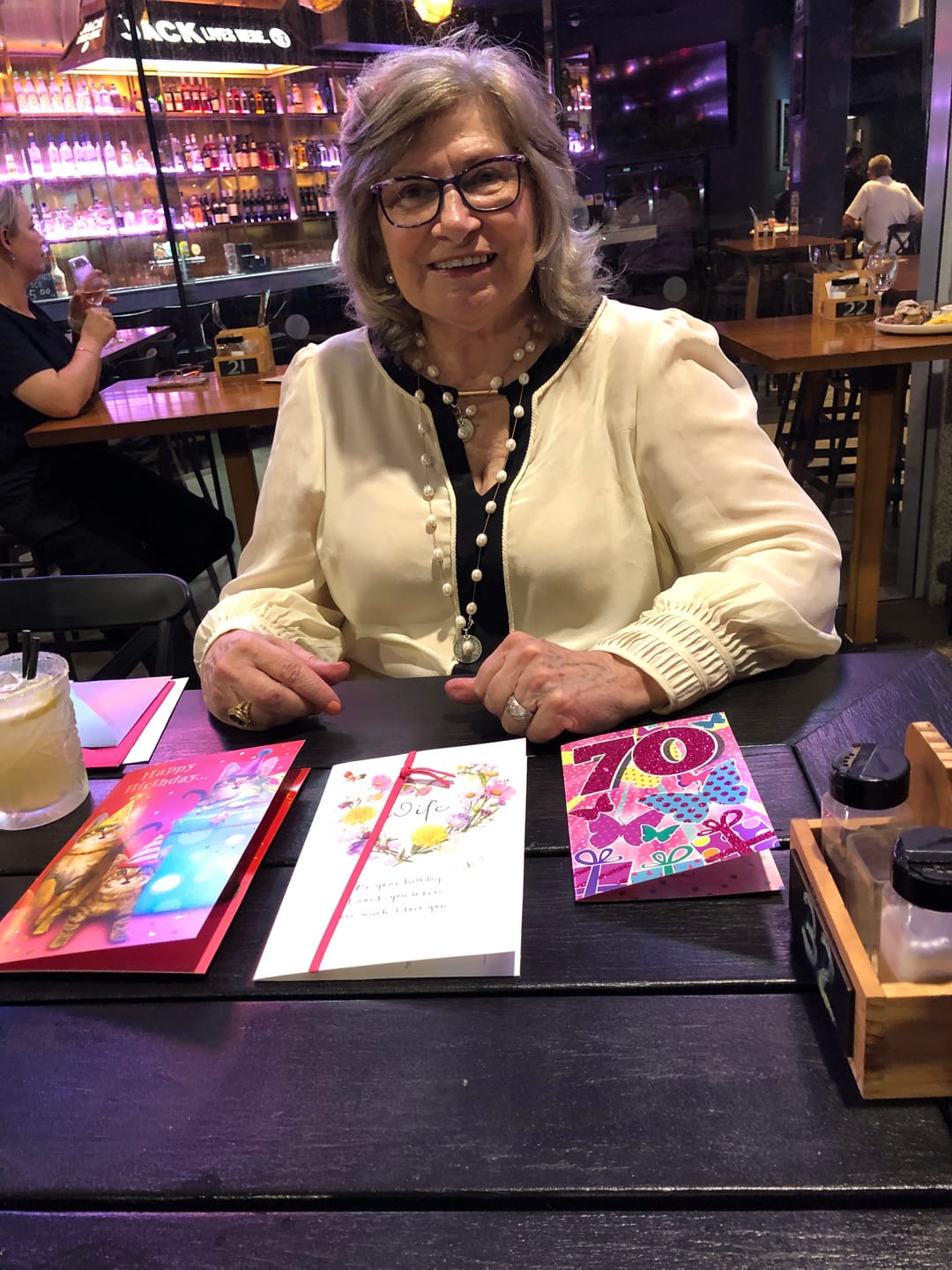 Customer photo review of Iris Pleated Cuff Silk Blouse in Cloud