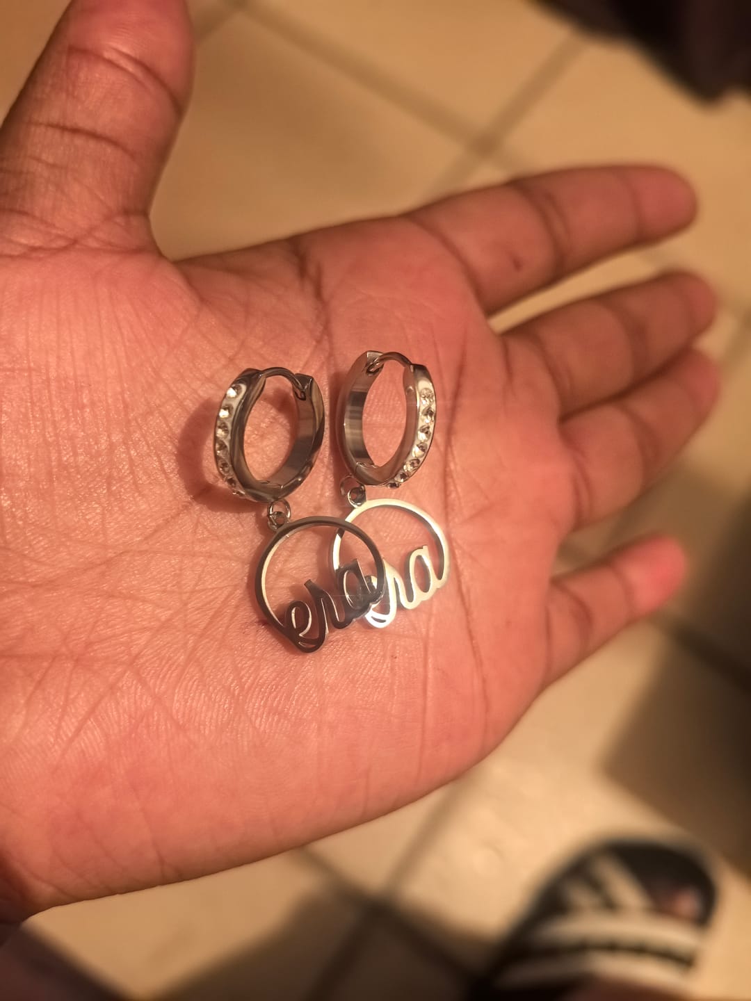 Customer photo review of Silver Precious Logo Earrings