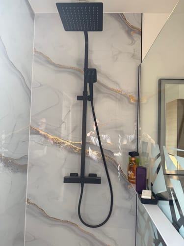 Customer photo review of Panneau Mural PVC Effet Marbre Doré – Étanche et facile à poser