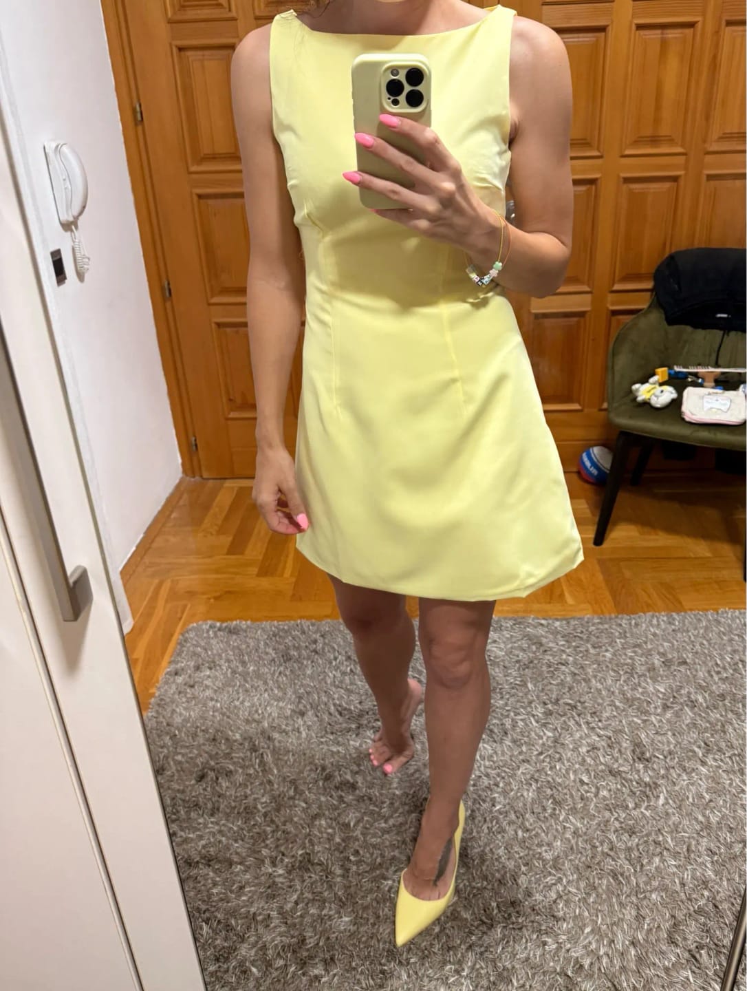 Customer photo review of Rina Ruffled Backless Mini Dress