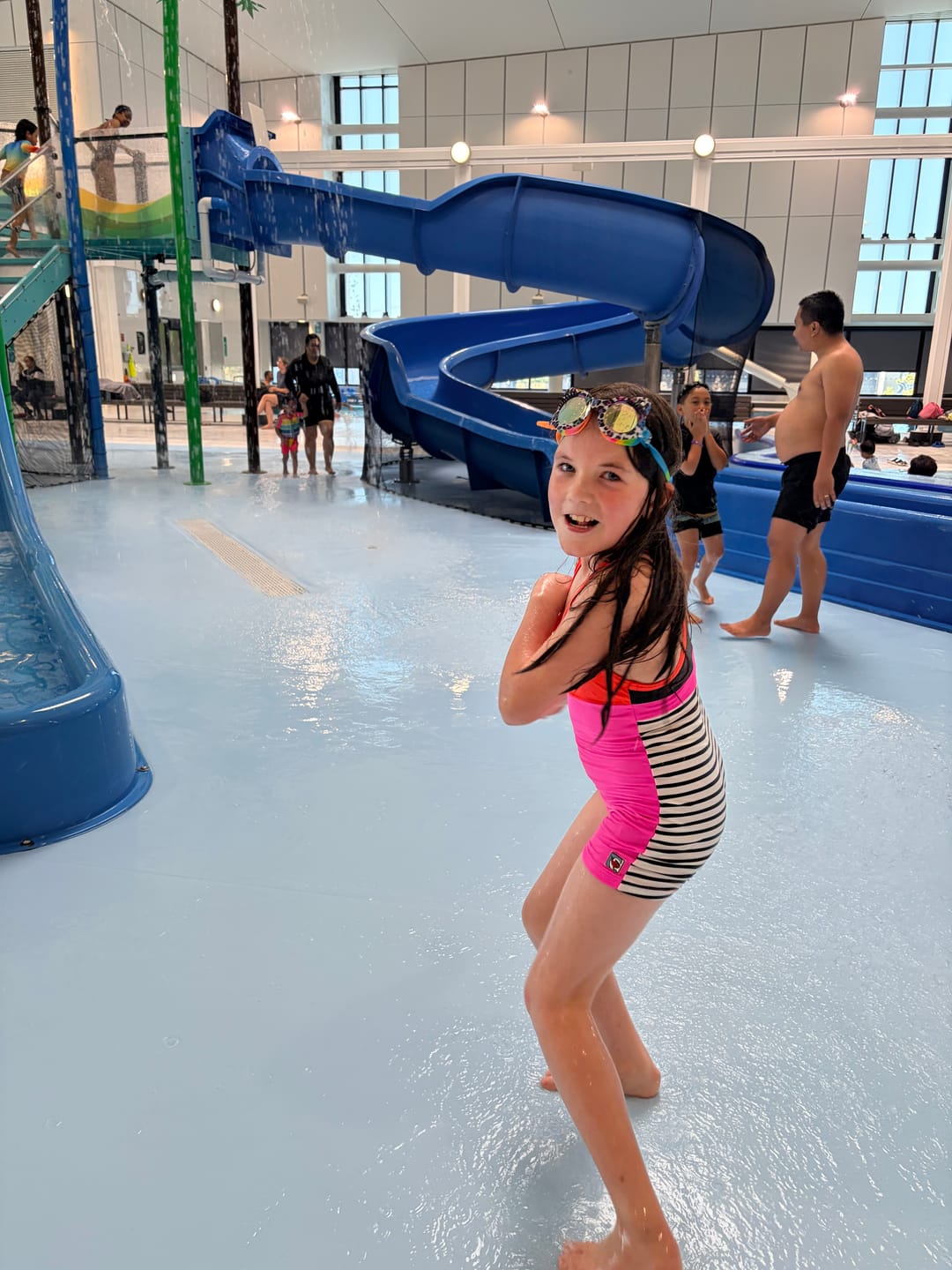 Customer photo review of Girls One Piece Orange and Pink Racerback UPF 50+Swimsuit