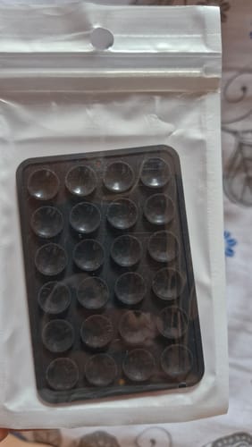 Customer's black StickyPod with multiple suction cups in its packaging.