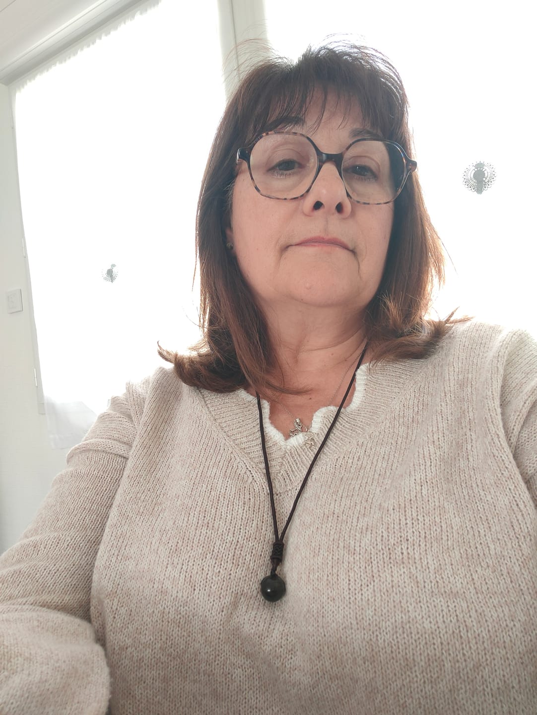 Customer photo review of Pendentif "Sphère" en Obsidienne Dorée