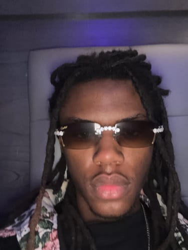 Customer photo review of Iced out Rimless Sunglasses Detroit style Black Buffs
