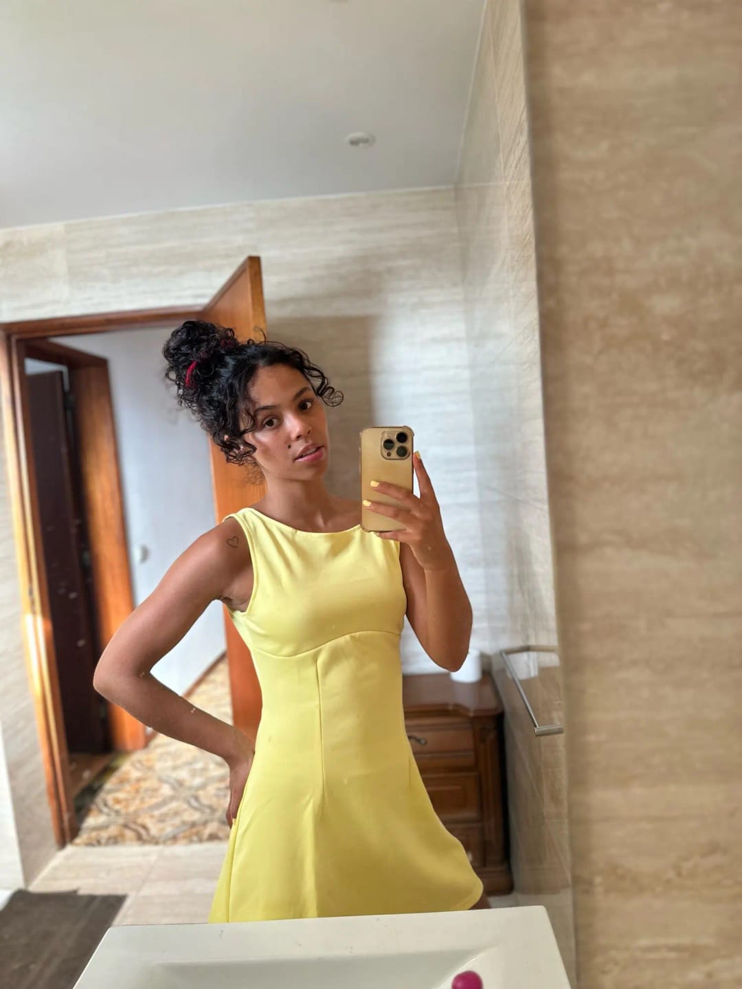 Customer photo review of Rina Ruffled Backless Mini Dress