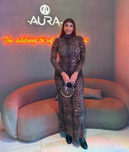 Reviewer in a full leopard print outfit, highlighting the matching Naked Print Headband.