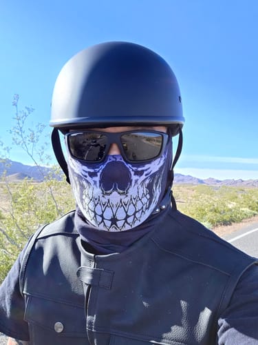 Reviewer wearing the flat black SOA Beanie helmet with a face mask and sunglasses outdoors.