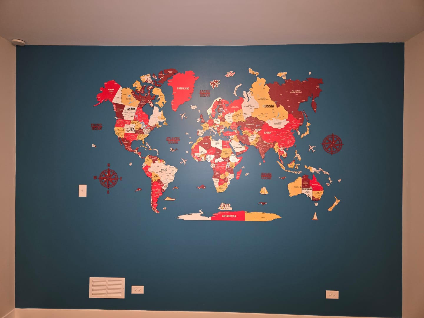 Customer photo review of 3D Wooden World Map - Vibrant Colors & Push Pins (Terracota)