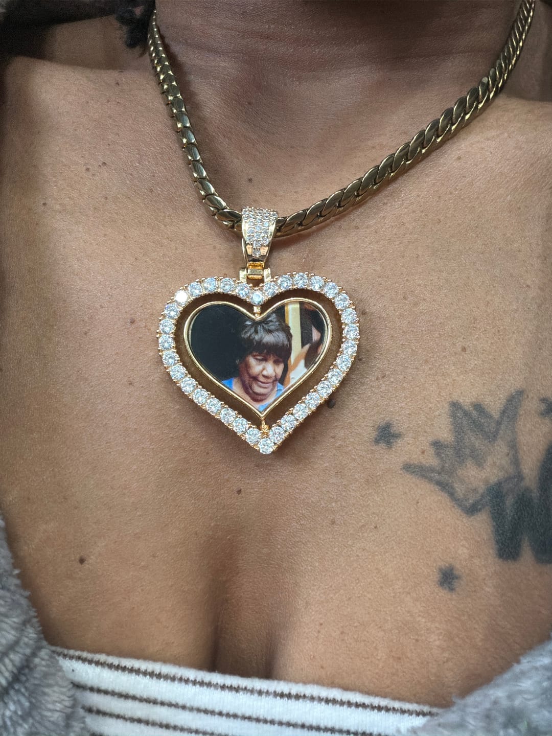 Customer photo review of Iced Heart Spinning Photo Pendant