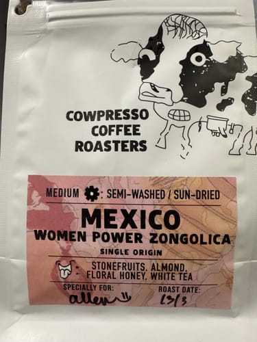 Reviewer's coffee parcel from the Weekly Surprise Plan, showing a bag of single origin Mexico Women Power Zongolica beans.