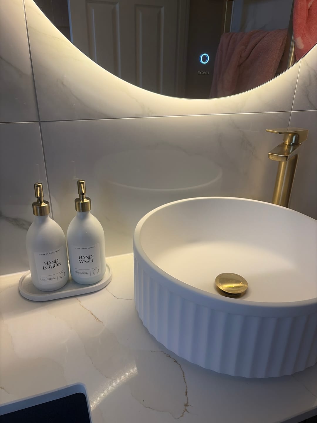 Customer photo review of Set of 2 Milky White Glass Bottle 500 ML with Metal Pump & Small Tray (White Label)