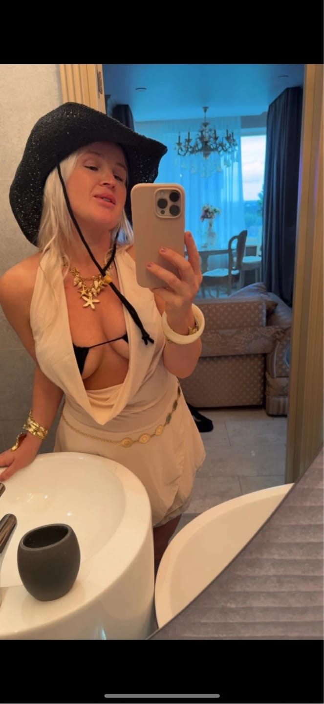 Customer photo review of Aiza Draped Deep Neck Mini Dress