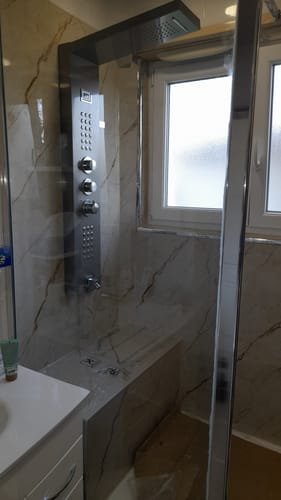Customer photo review of Panneau Mural PVC Effet Marbre Beige – Imperméable Salle De Bain et Douche