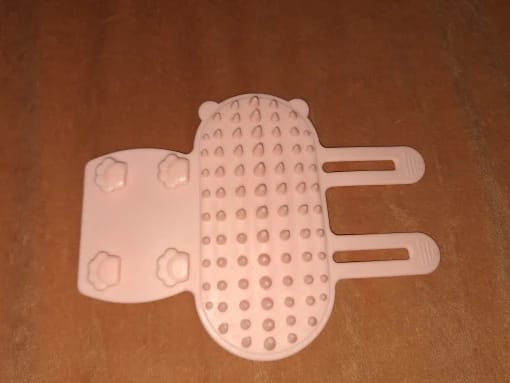Customer photo review of Self Grooming Cat Brush for Happy Scratch Loving Cats