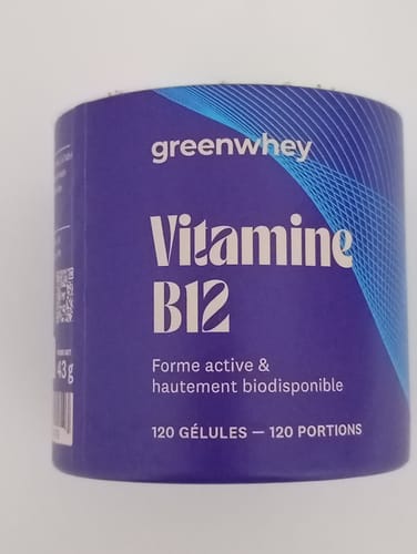 Flacon de Vitamine B12 du client, montrant l'étiquette bleue en gros plan.