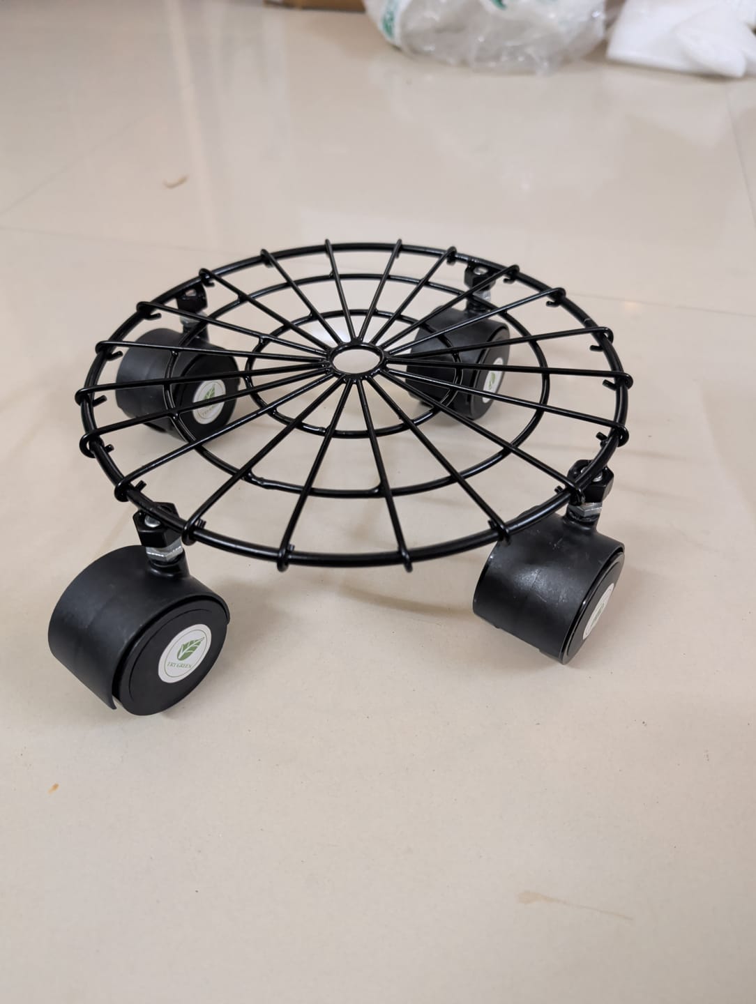 Customer photo review of TryGreen Fyra Wheel Rolling Plant Stand for Planters