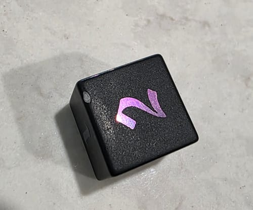 Customer photo review of Inked Black Night Raised Obsidian Hand Carved Dice DND Set