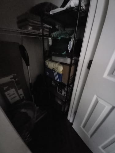 Customer photo review of Reibii 5-Tier Metal Shelving Unit with 330 lb Capacity - Adjustable Storage Rack with Side Rails & Hooks