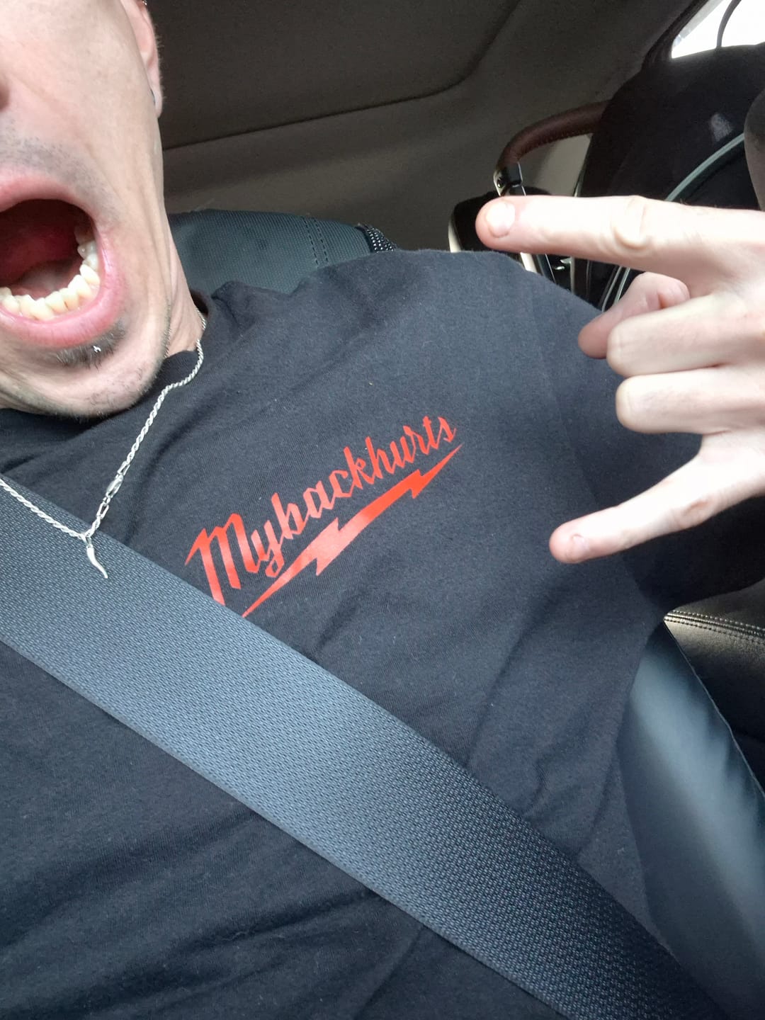Customer photo review of My Back Hurts Tee