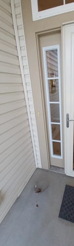 Customer's newly installed Clear 5 Lite Glass and Frame Kit shown as a sidelite on their home's entryway.