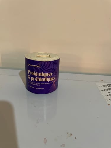 Photo d'évaluation du pot de Probiotiques & Prébiotiques sur une surface blanche.