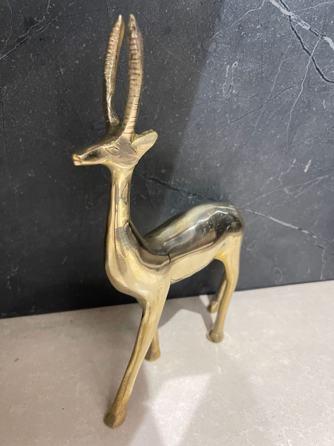 Customer photo review of Handcrafted Brass Deer Idol Vastu Remedy for Stability, Stamina and Energy Balance for WNW Zone, Home and Office Placement | 12 x 22 cm | 820 gm