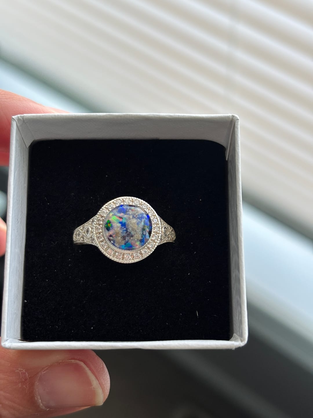 Customer photo review of Bedazzled Filigree Circle Opal Cremation Ring