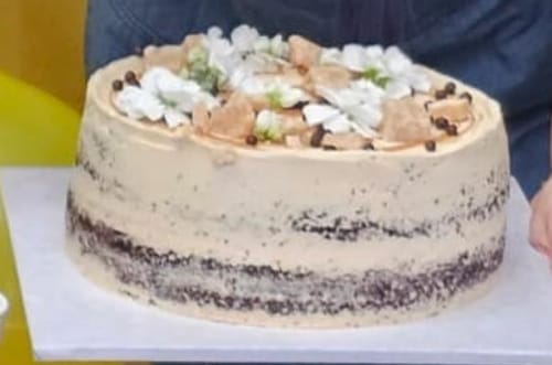 Customer photo review of chocolate caramel cake