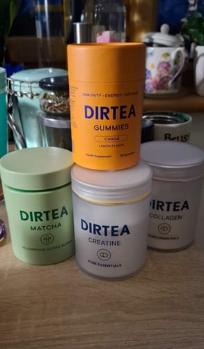 Customer's DIRTEA Creatine jar shown with their collection of Matcha, Collagen, and Gummies products.