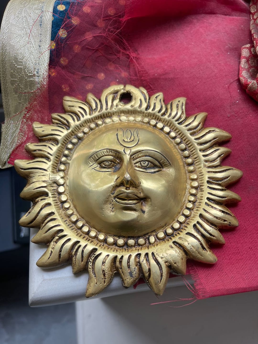 Customer photo review of Brass Vastu Sun Wall Hanging Idol Vastu Remedy for East Direction Balance, Fame and Positive Energy for Home, Office and Entrance Decor | 15 x 15 cm | 800 g