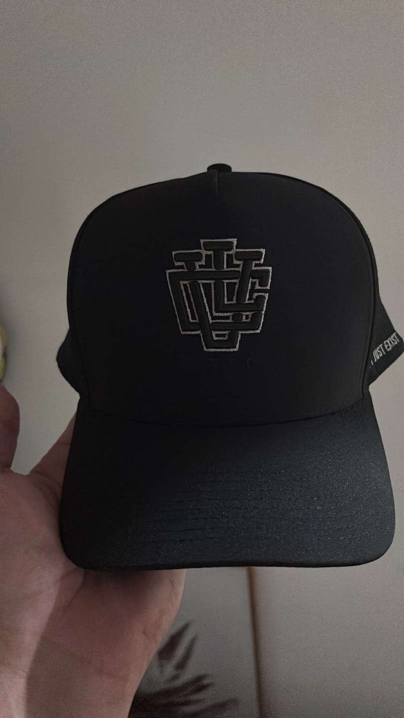 Customer photo review of ULTRA FIT Black Water-Resistant A-Frame Snapback