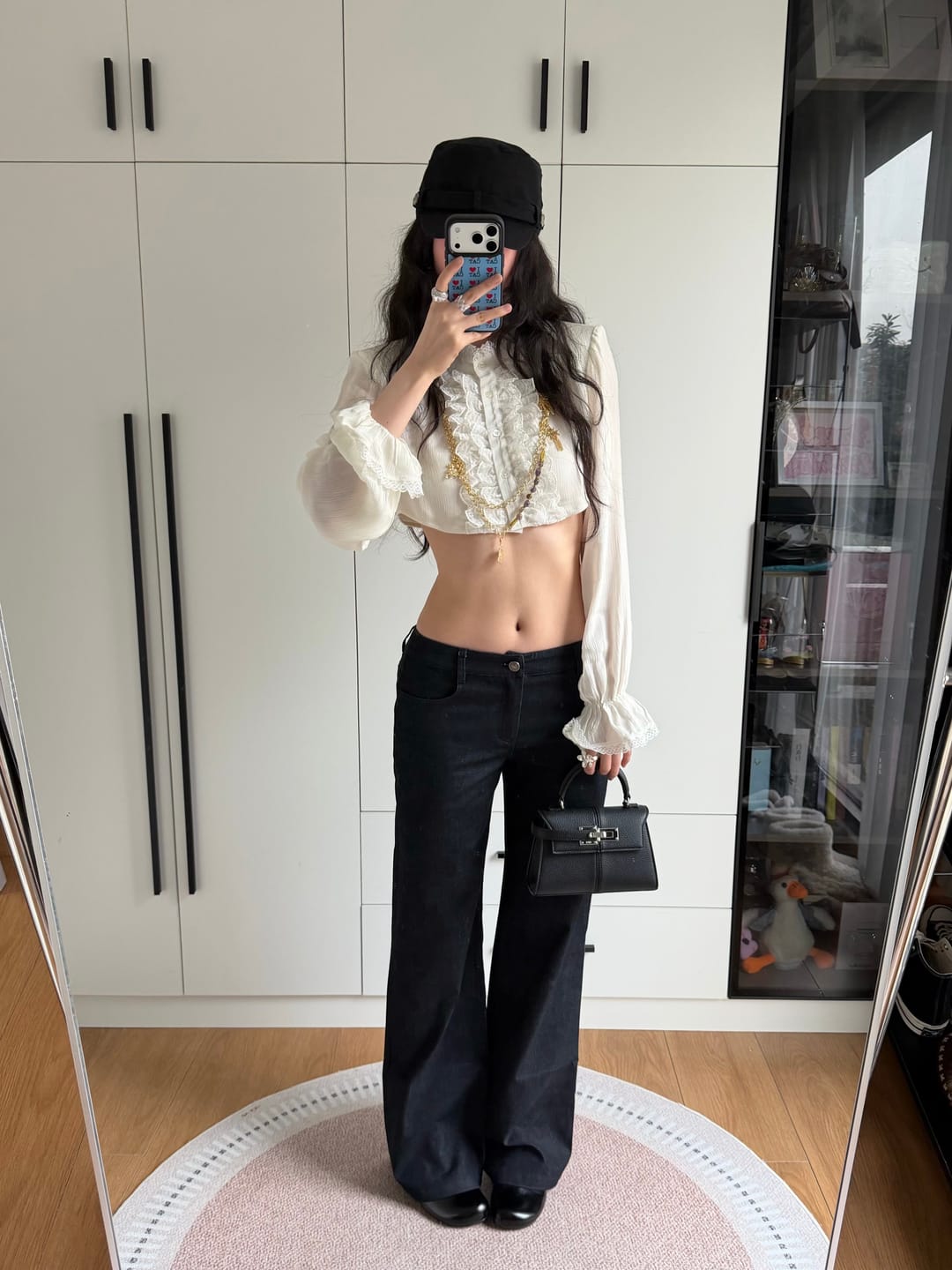 Customer photo review of Hydrae Lace Ruffle Cropped Blouse High Neck Sheer Long Sleeve Top
