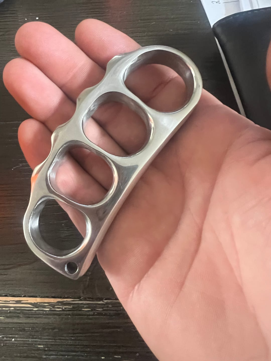 Customer photo review of Solid 304 Stainless Steel Brass Knuckles Self-Defense Tool