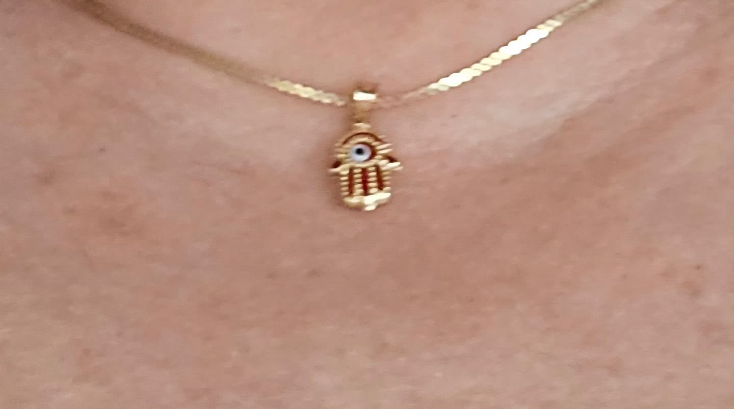 Customer photo review of 14K Gold Evil Eye Hamsa Pendant