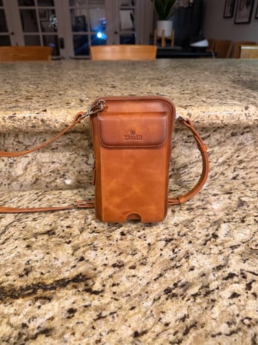 Customer photo review of Ferrara Unisex Crossbody Leather Phone Purse