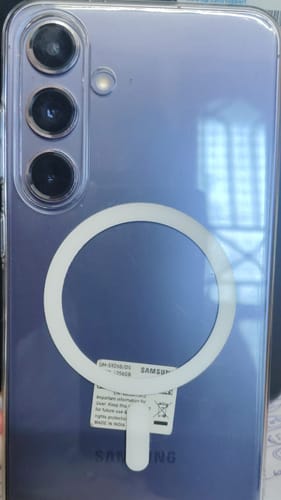 Customer's clear Anti Yellow Magsafe Case on a purple Samsung phone, showing the prominent white magnetic ring on the back.