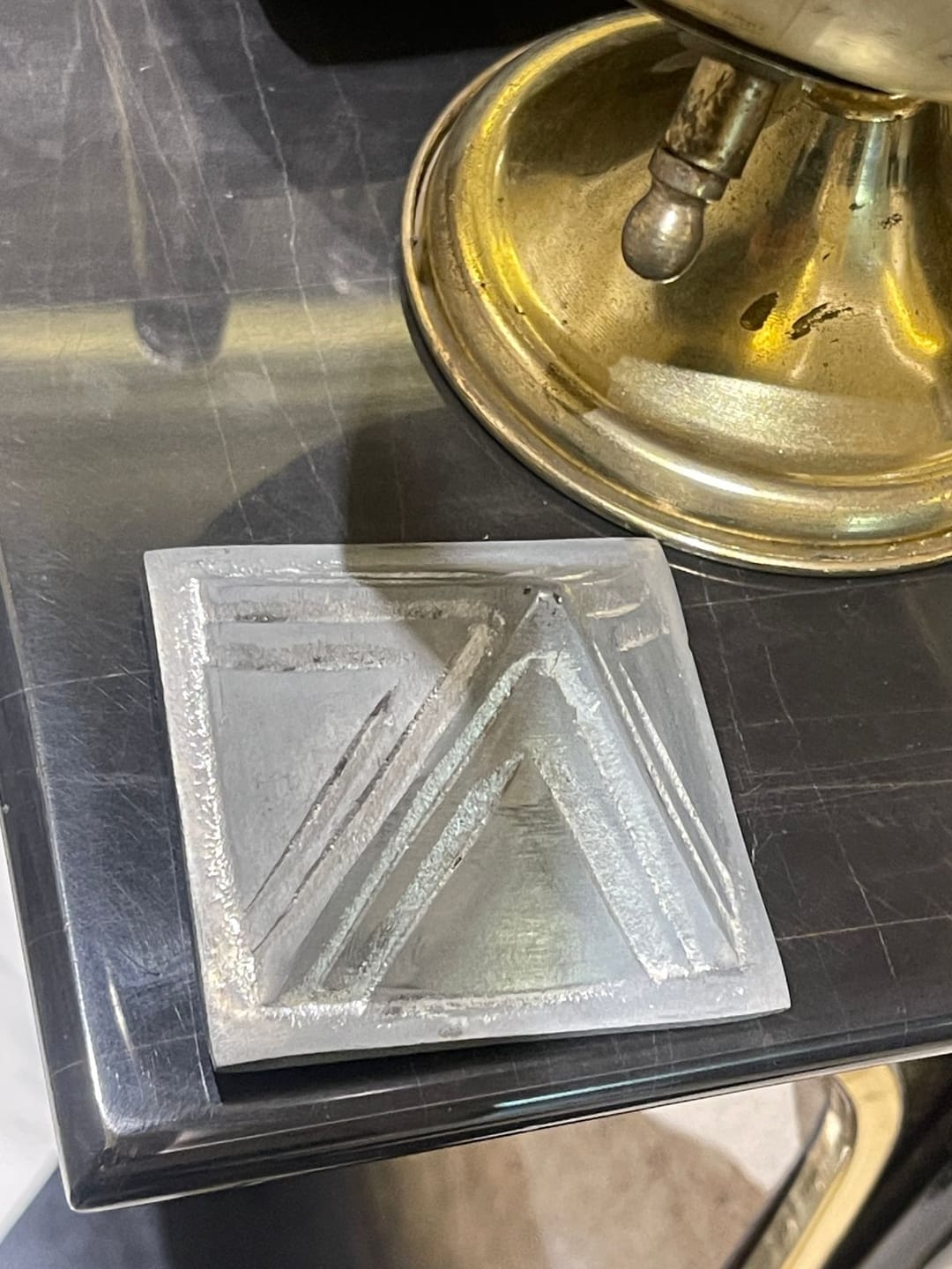 Customer photo review of 2-Layer Aluminium Pyramid Vastu Remedy for Health, Wealth and Positive Energy Balance for Home Entrance, Main Door and Kitchen Placement | 7.6 cm | 110 g