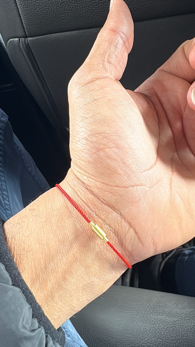Customer photo review of Protective Red Cord Gold Bracelet