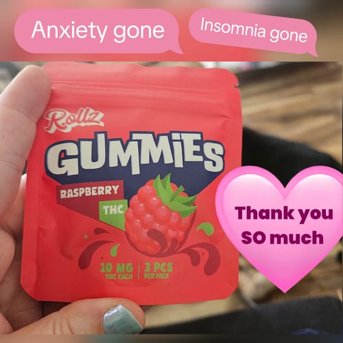 Customer holding a red pouch of Rollz Raspberry THC Gummies, highlighting their positive experience.