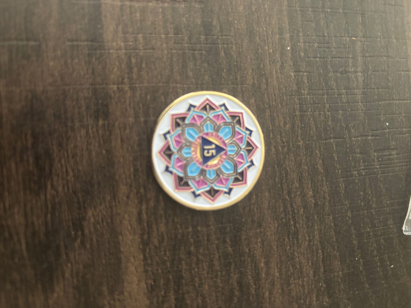 Customer photo review of 15 Year Sobriety Mint 'In Bloom' Lotus Flower Gold Plated AA Recovery Medallion - Fifteen Year Chip/Coin - White