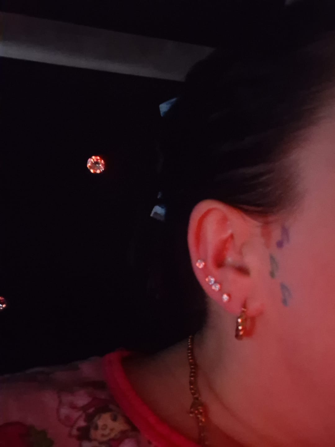 Customer photo review of Twist Hoop Earrings