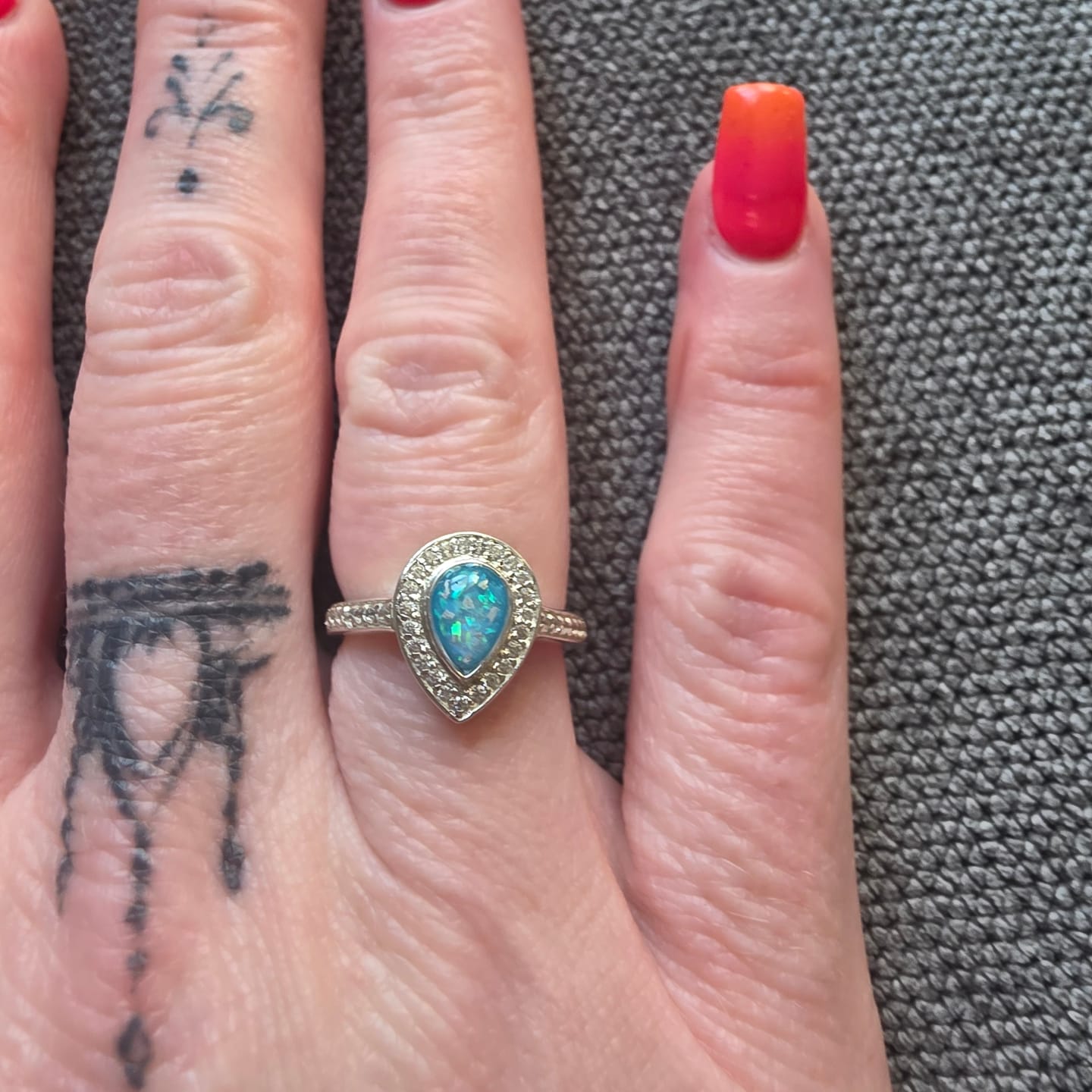 Customer photo review of Droplet Halo Full Cubic Zirconia Keepsake Ring