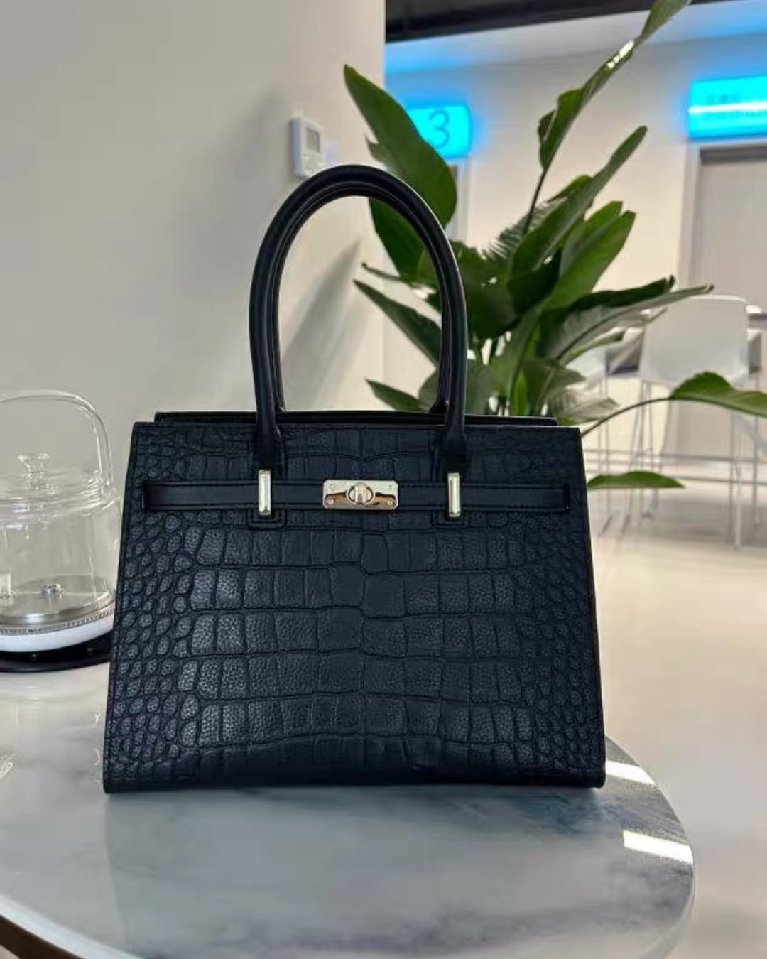 Customer photo review of Tang Red 27 Obsidian Crocodile-Embossed Tote