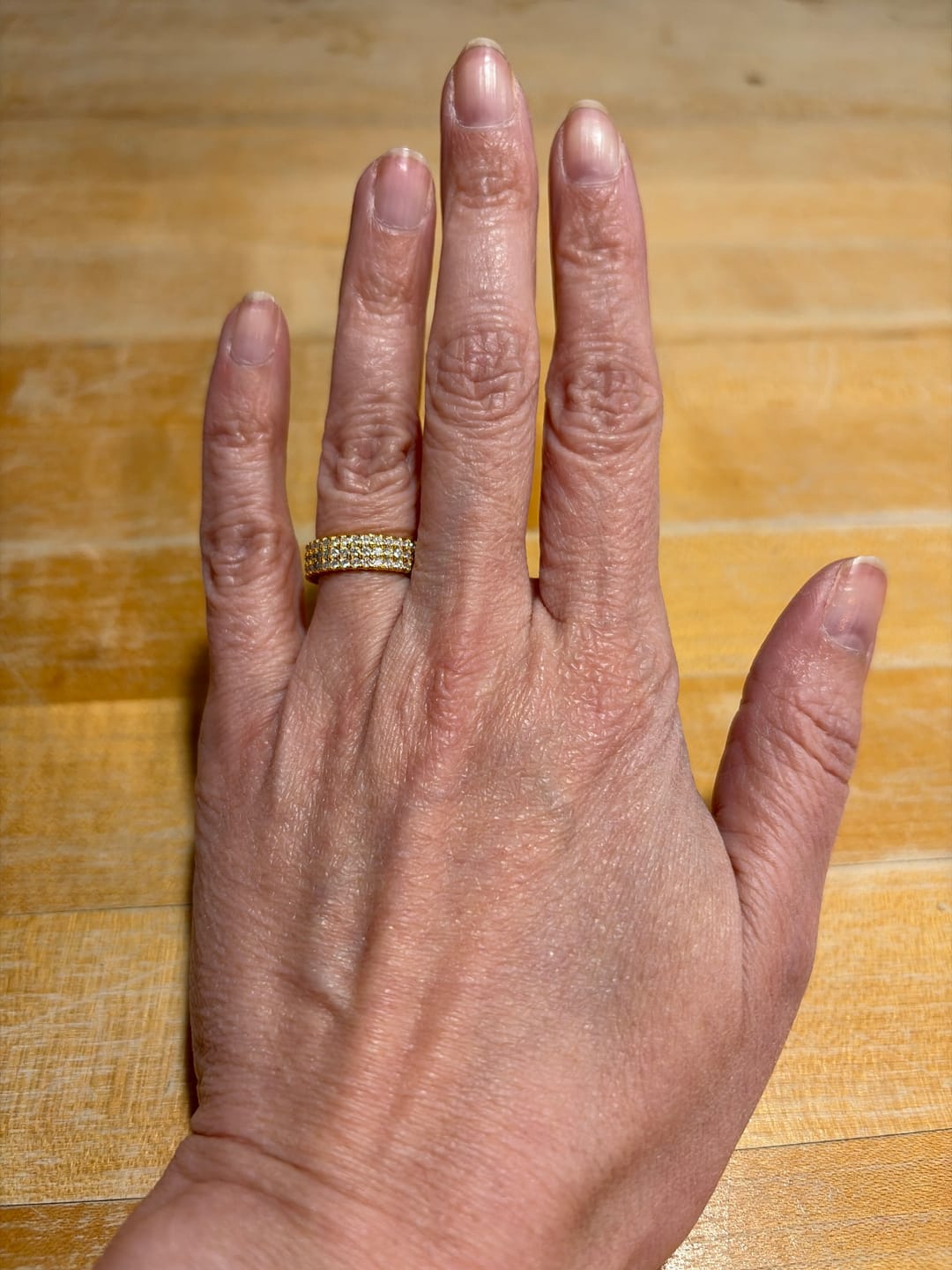 Customer photo review of 5mm Triple Row Moissanite Eternity Ring