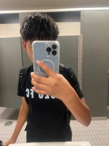 Reviewer showing their styled, shiny hair after using the Hair Clay.