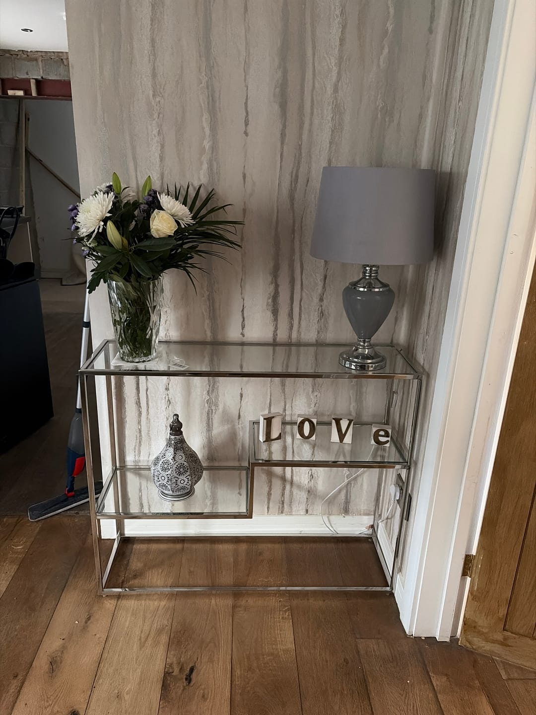 Customer photo review of Aleandra Clear Glass and Silver Metal Console Table